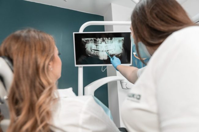 The,Dentist,Carefully,Analyzes,The,Mri,Image,Of,The,Oral orthodontics alexandria