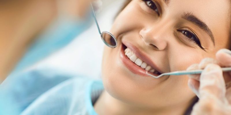 Smiling,Face,Of,A,Woman,At,The,Dentist,,Close-up.,Beautiful dental cleaning near me